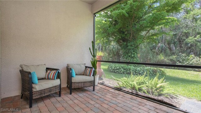7874 Bucks Run Dr, Naples, FL 34120 - view of sunroom