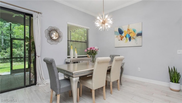 7874 Bucks Run Dr, Naples, FL 34120 - dining area featuring a chandelier, ornamental molding, baseboards, and wood finished floors