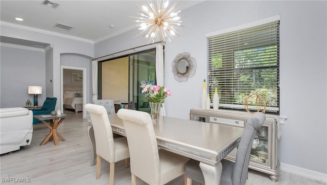 7874 Bucks Run Dr, Naples, FL 34120 - dining space featuring a chandelier, crown molding, light wood-style floors, and recessed lighting