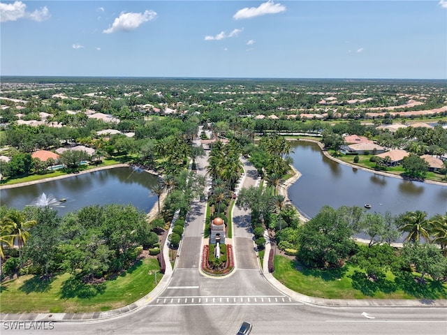15329 Laughing Gull Ln, Bonita Springs, FL 34135 - drone / aerial view of a large body of water and a tree filled landscape
