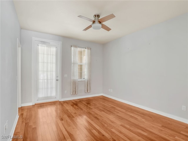 15329 Laughing Gull Ln, Bonita Springs, FL 34135 - unfurnished room with light wood-style floors and ceiling fan