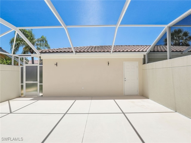 15329 Laughing Gull Ln, Bonita Springs, FL 34135 - view of patio featuring glass enclosure