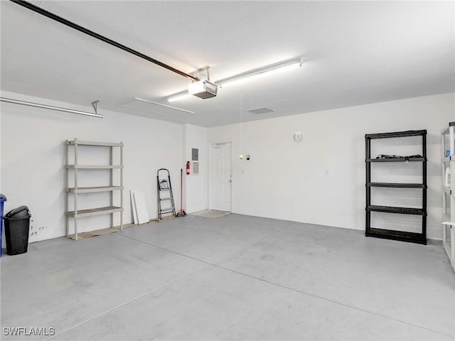 15329 Laughing Gull Ln, Bonita Springs, FL 34135 - garage with a garage door opener