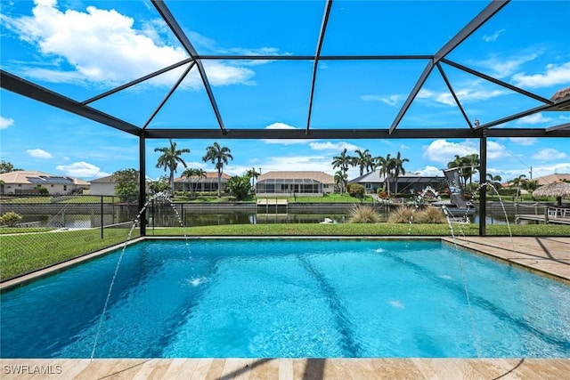 208 SW 15th St, Cape Coral, FL 33991 - view of swimming pool with glass enclosure, a residential view, a patio, and a water view
