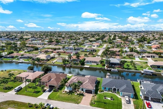 208 SW 15th St, Cape Coral, FL 33991 - aerial perspective of suburban area featuring a nearby body of water