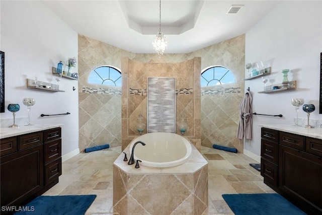 208 SW 15th St, Cape Coral, FL 33991 - full bathroom with a garden tub, vanity, and baseboards