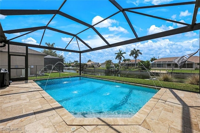 208 SW 15th St, Cape Coral, FL 33991 - swimming pool featuring a patio area, a lanai, and a residential view