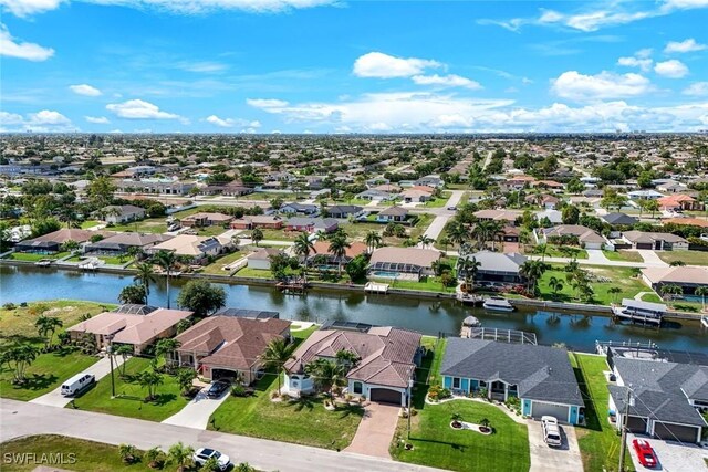 208 SW 15th St, Cape Coral, FL 33991 - aerial perspective of suburban area with a large body of water