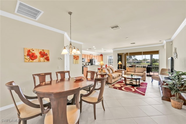 8460 Benelli Ct, Naples, FL 34114 - dining room with ornamental molding, light tile patterned flooring, and a chandelier
