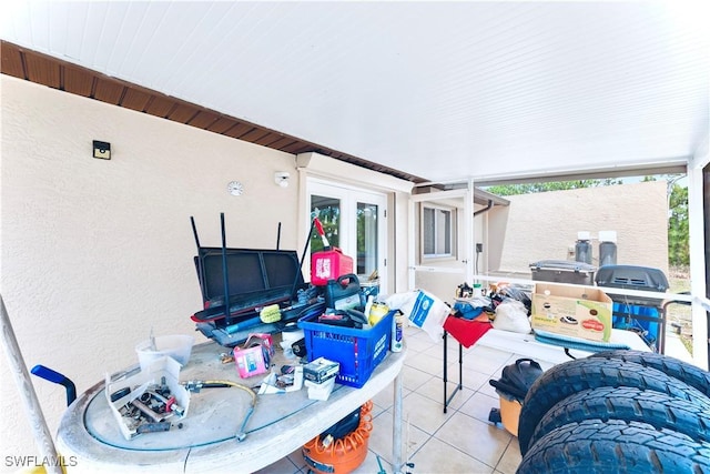 869/871 Eisenhower Blvd, Lehigh Acres, FL 33974 - view of patio featuring french doors