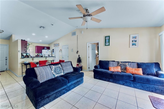 869/871 Eisenhower Blvd, Lehigh Acres, FL 33974 - living room with light tile patterned floors, vaulted ceiling, and ceiling fan
