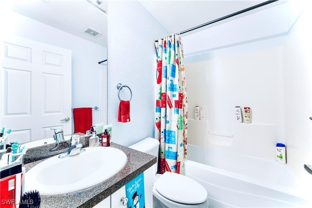 869/871 Eisenhower Blvd, Lehigh Acres, FL 33974 - bathroom with shower / bath combination with curtain, toilet, and vanity
