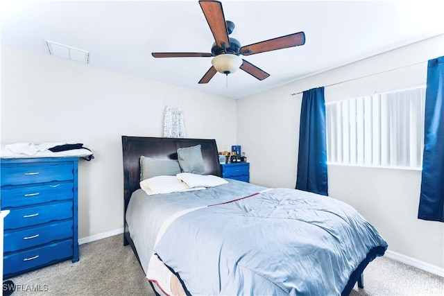 869/871 Eisenhower Blvd, Lehigh Acres, FL 33974 - bedroom featuring carpet, baseboards, and a ceiling fan