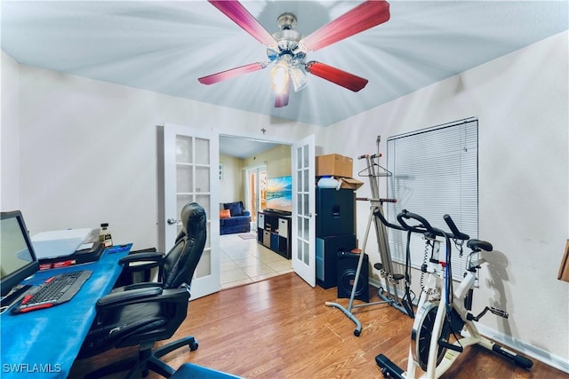 869/871 Eisenhower Blvd, Lehigh Acres, FL 33974 - home office featuring french doors, wood finished floors, and ceiling fan