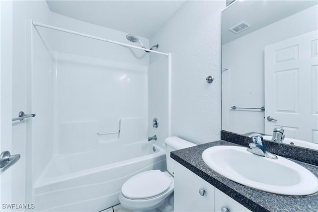 869/871 Eisenhower Blvd, Lehigh Acres, FL 33974 - bathroom with toilet, shower / bath combination, a textured wall, and vanity