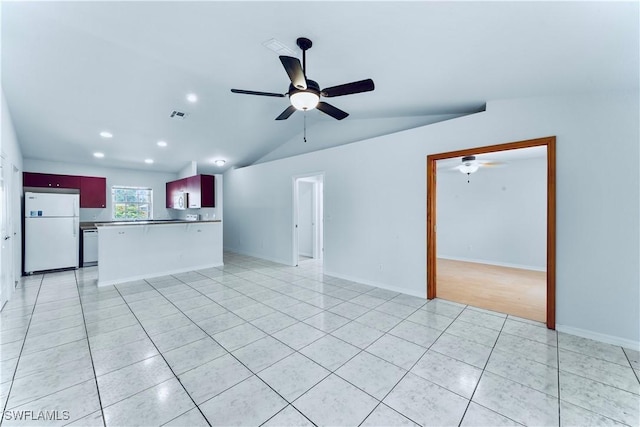 869/871 Eisenhower Blvd, Lehigh Acres, FL 33974 - unfurnished living room featuring light tile patterned floors, a ceiling fan, vaulted ceiling, and recessed lighting