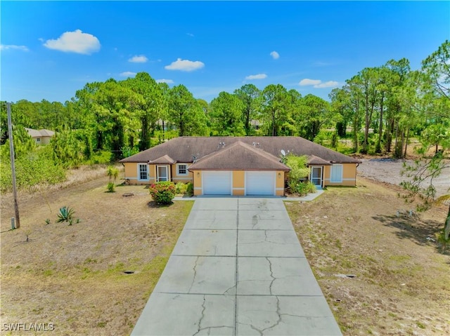 869/871 Eisenhower Blvd, Lehigh Acres, FL 33974 - single story home with an attached garage and driveway