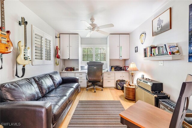 2912 SW 1st Ter, Cape Coral, FL 33991 - office featuring ceiling fan, light wood-style flooring, and built in desk
