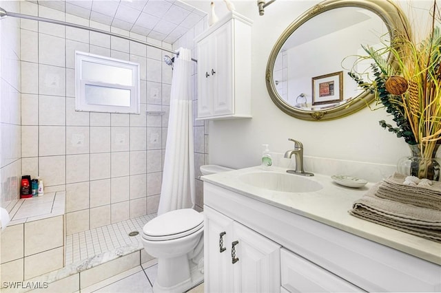 2912 SW 1st Ter, Cape Coral, FL 33991 - full bathroom with vanity, toilet, a shower stall, and tile patterned floors