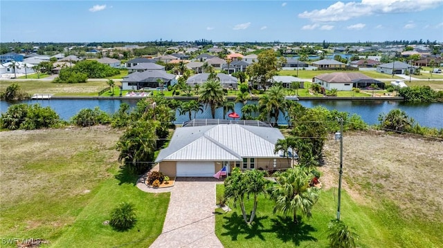 2912 SW 1st Ter, Cape Coral, FL 33991 - aerial perspective of suburban area with a nearby body of water