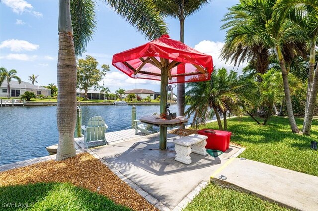 2912 SW 1st Ter, Cape Coral, FL 33991 - view of patio with a water view and a dock