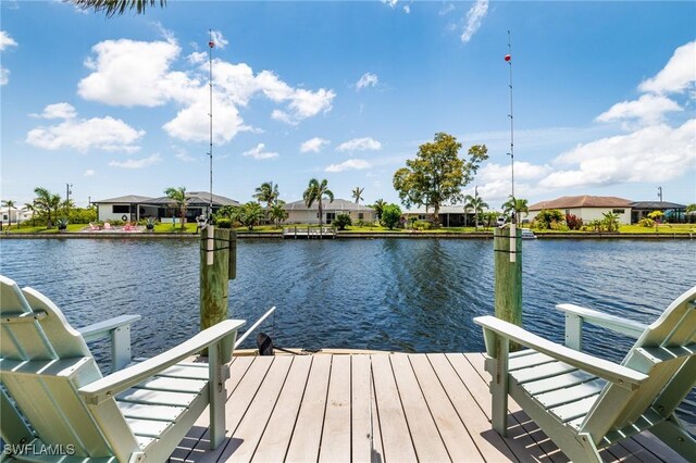 2912 SW 1st Ter, Cape Coral, FL 33991 - dock with a water view and a residential view