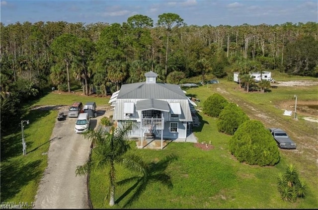 19790 Burgundy Farms Rd, Estero, FL 33928 - aerial view of property and surrounding area with a forest
