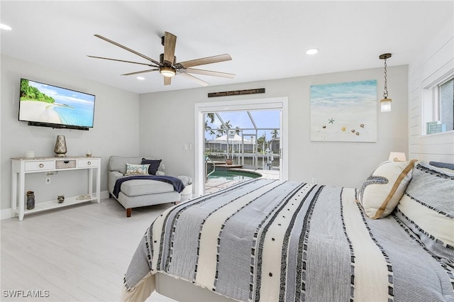 bedroom featuring access to outside, light wood-style flooring, multiple windows, recessed lighting, and a ceiling fan