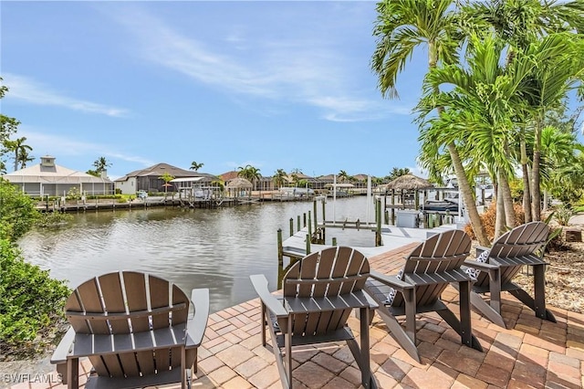dock area with a water view and a residential view