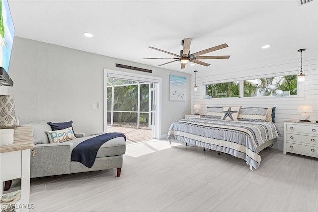 bedroom with access to exterior, recessed lighting, light wood-type flooring, and a ceiling fan