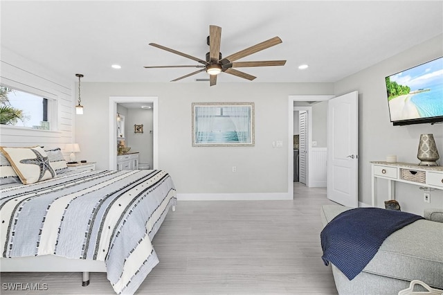 bedroom with recessed lighting, light wood-style flooring, baseboards, ensuite bathroom, and ceiling fan