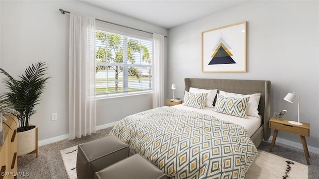 bedroom featuring carpet and baseboards