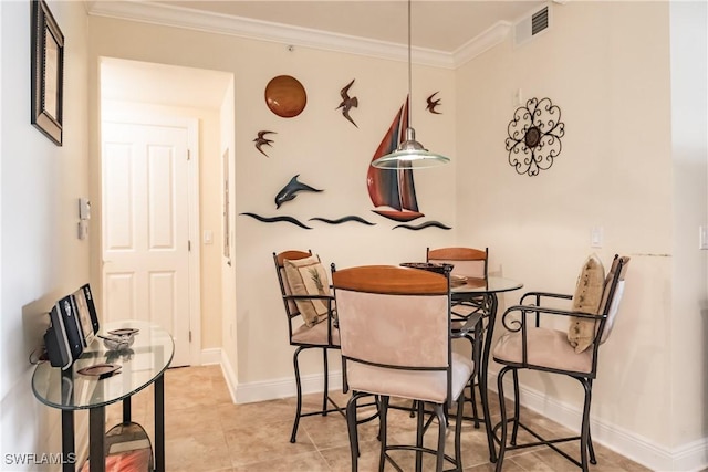 2825 Palm Beach Blvd Unit 203, Fort Myers, FL 33916 - dining area featuring crown molding, baseboards, and tile patterned floors