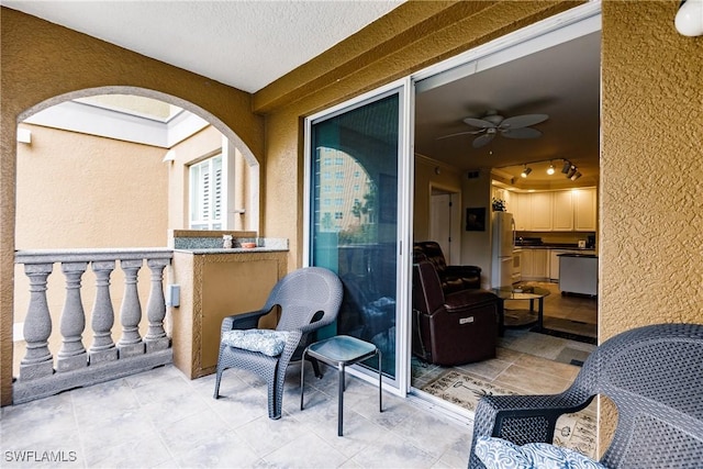 2825 Palm Beach Blvd Unit 203, Fort Myers, FL 33916 - balcony featuring a ceiling fan