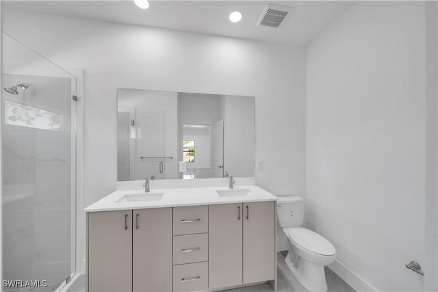 1904 E 11th St, Lehigh Acres, FL 33936 - full bathroom featuring a stall shower, toilet, baseboards, and double vanity