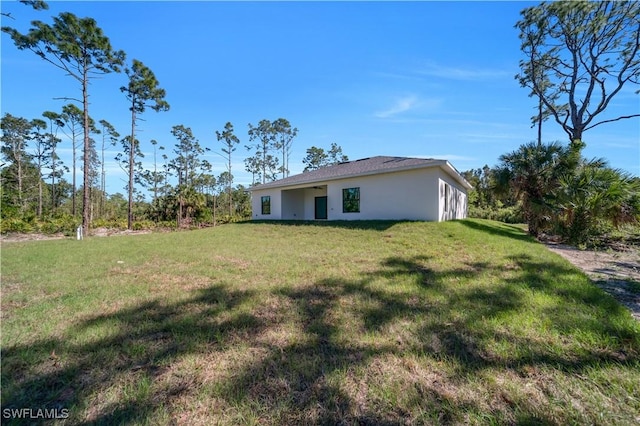 1904 E 11th St, Lehigh Acres, FL 33936 - view of grassy yard