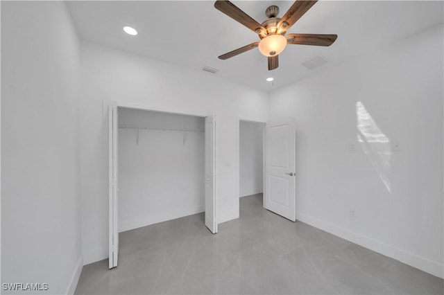 1904 E 11th St, Lehigh Acres, FL 33936 - unfurnished bedroom featuring a closet, baseboards, a ceiling fan, and recessed lighting