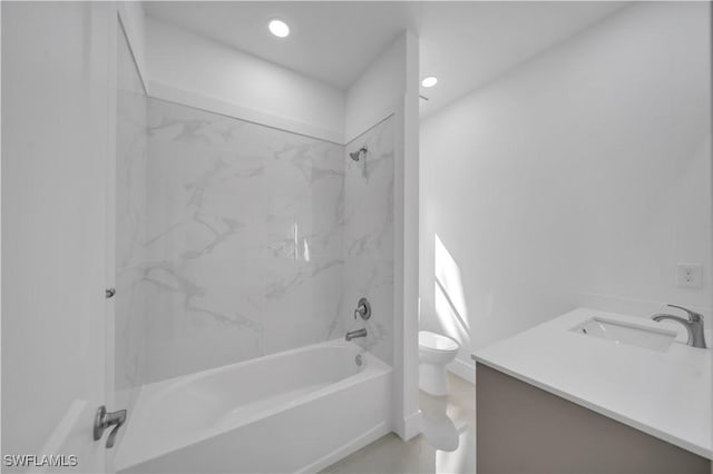 1904 E 11th St, Lehigh Acres, FL 33936 - bathroom with toilet, bathing tub / shower combination, vanity, and recessed lighting