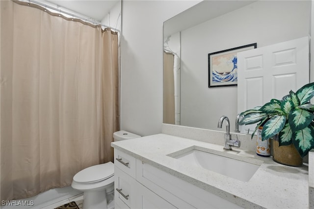 4174 58th Ave NE, Naples, FL 34120 - full bathroom with toilet, vanity, and shower / bath combo with shower curtain