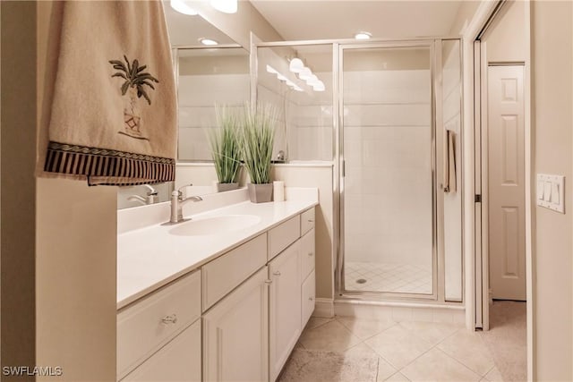 1878 Tarpon Bay Dr S Unit 102, Naples, FL 34119 - full bath featuring vanity, a stall shower, tile patterned floors, and recessed lighting