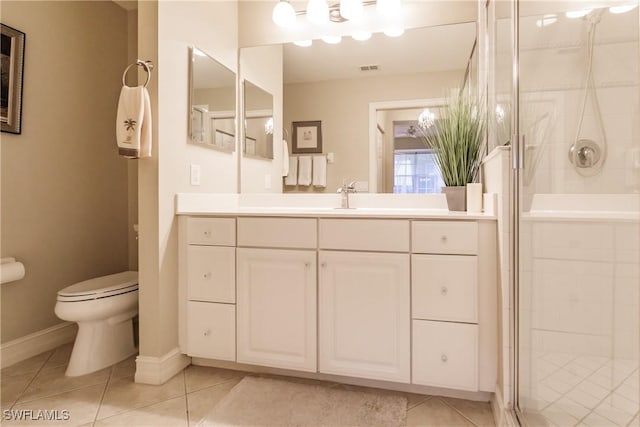 1878 Tarpon Bay Dr S Unit 102, Naples, FL 34119 - bathroom with a shower stall, toilet, tile patterned flooring, baseboards, and vanity