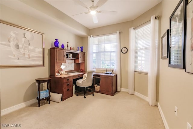 1878 Tarpon Bay Dr S Unit 102, Naples, FL 34119 - home office with a ceiling fan, light colored carpet, and baseboards