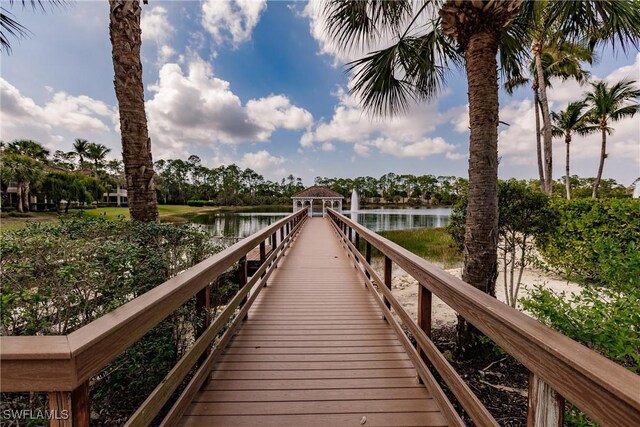 1878 Tarpon Bay Dr S Unit 102, Naples, FL 34119 - dock featuring a gazebo and a water view