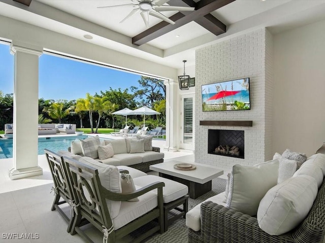186 N St, Naples, FL 34108 - view of patio featuring an outdoor living space with a fireplace, a ceiling fan, and an outdoor pool