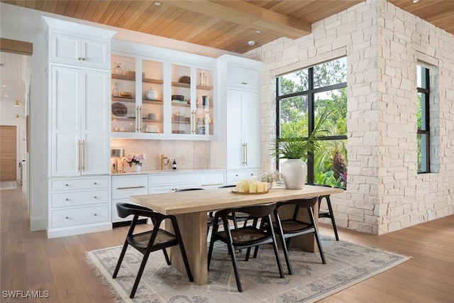 186 N St, Naples, FL 34108 - dining room featuring wooden ceiling with exposed beams and light wood-type flooring