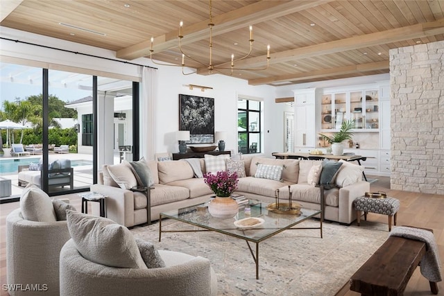 186 N St, Naples, FL 34108 - living area featuring wood finished floors, wooden ceiling with exposed beams, and recessed lighting