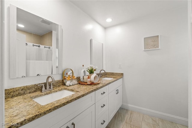 2210 SW 14th Ave, Cape Coral, FL 33991 - bathroom featuring double vanity, baseboards, curtained shower, and recessed lighting
