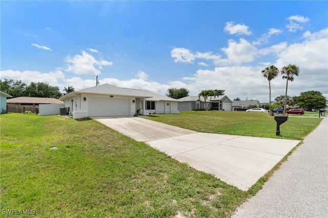 2210 SW 14th Ave, Cape Coral, FL 33991 - ranch-style home featuring driveway, a garage, central AC unit, and a front yard