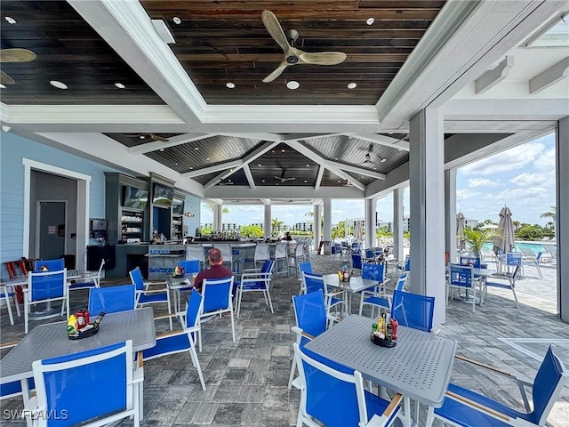 5583 Double Eagle Cir Unit 4141, Ave Maria, FL 34142 - view of patio with a ceiling fan and outdoor dining space