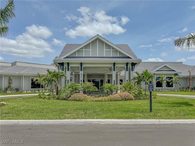 5583 Double Eagle Cir Unit 4141, Ave Maria, FL 34142 - view of front of property featuring a front yard